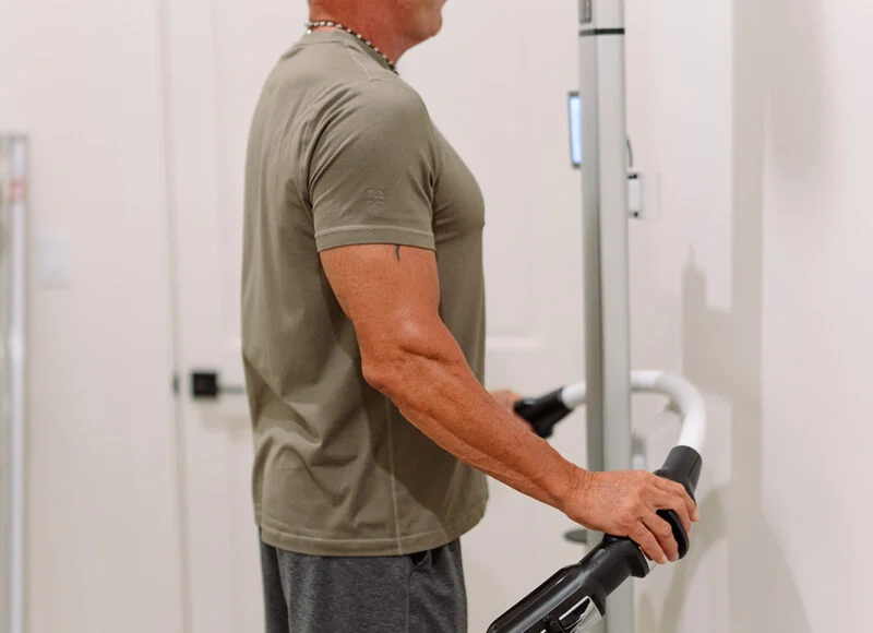 Patient on a medical-grade body composition scale